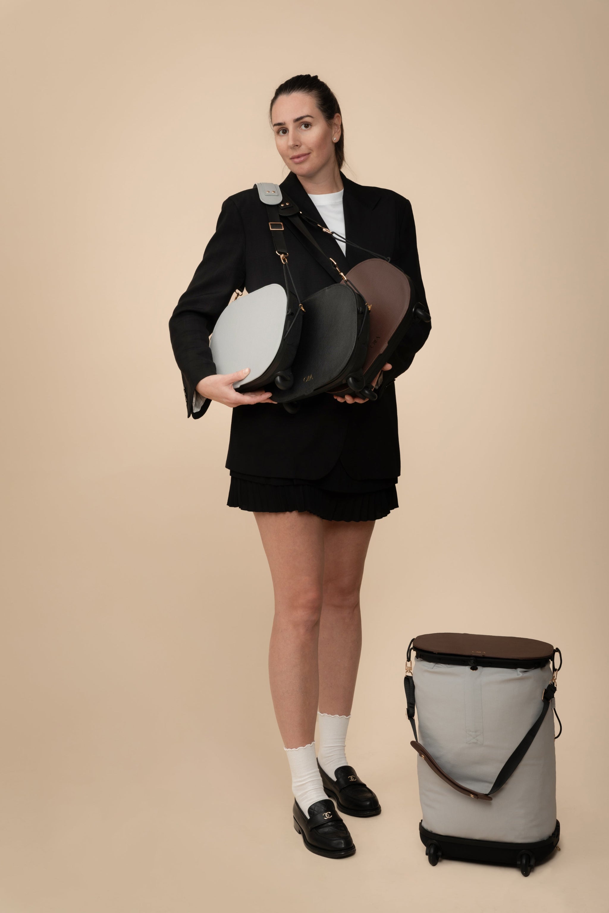 Olla Bag convertible handbag in gray, black and brown. Maximum size trolley